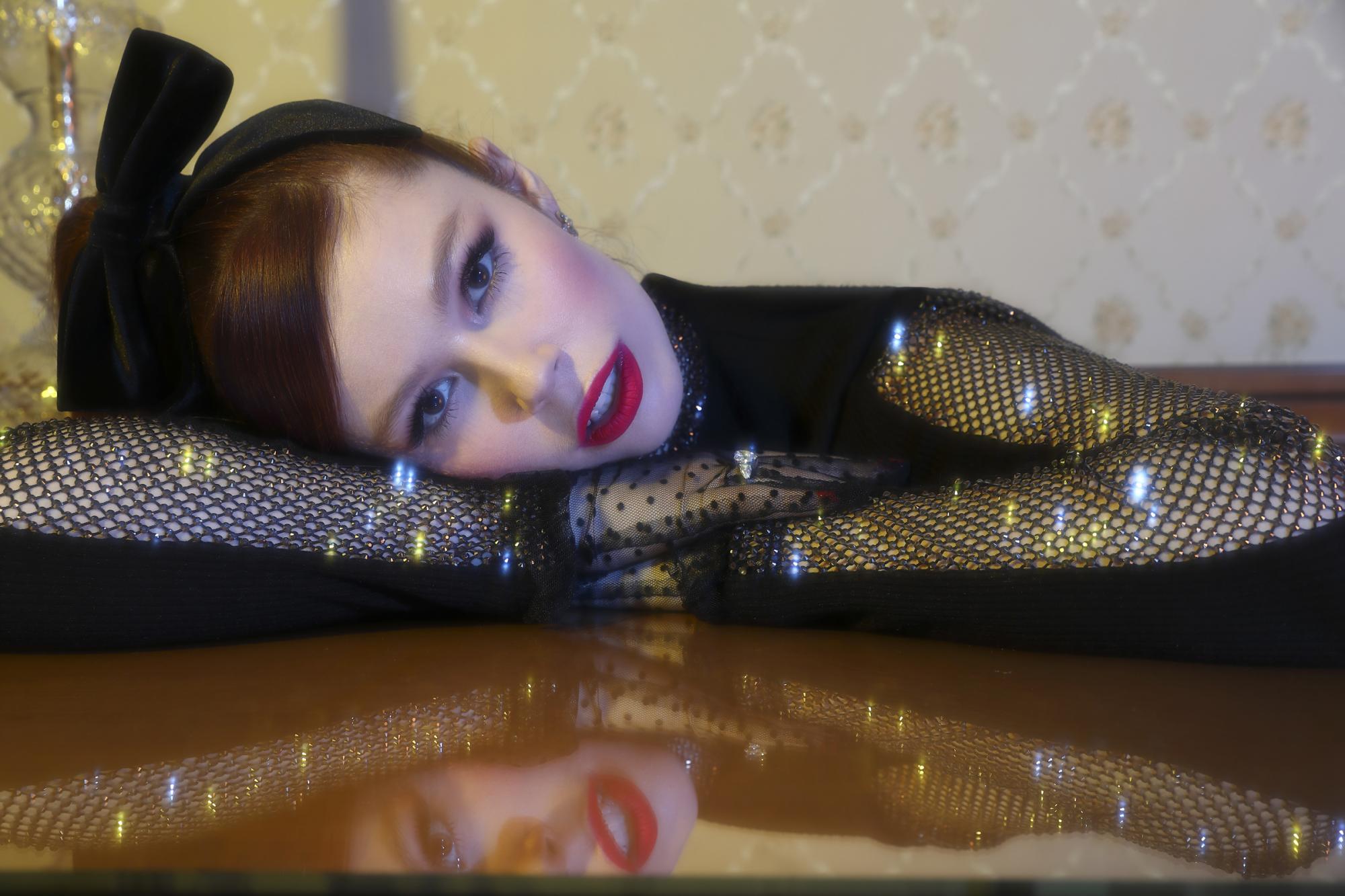 Банты, воланы и розовый: Андре Тан и Соня Плакидюк показали, как нарядиться на Новый год (фото)